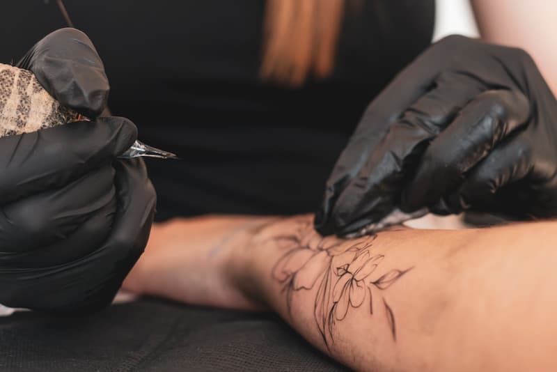 Fine line tattoo in progress at Shakti Tattoo studio
